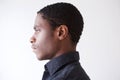 Profile young african man against white background Royalty Free Stock Photo