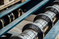 Profiling rolls of sheet forming machine close up Royalty Free Stock Photo