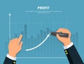 Profit. Businessman draws graph of financial growth Royalty Free Stock Photo