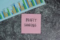 Profit Sharing write on sticky notes on the table. Finance or Business concept Royalty Free Stock Photo