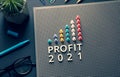 Profit 2021 text with pin garph chart on business table.vision to success and strategy Royalty Free Stock Photo