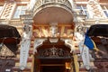 Rich decoration of old Profitable house Zabludovsky with Atlanteans in Odessa, Ukraine