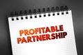 Profitable Partnership text on notepad, concept background Royalty Free Stock Photo