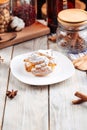 Profiterole sprinkled with powdered sugar