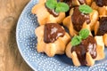 Profiteroles with chocolate sauce Royalty Free Stock Photo