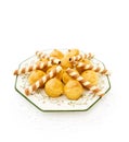 Profiteroles with waffles on white Royalty Free Stock Photo