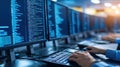 Programmer Coding on Multiple Monitors Royalty Free Stock Photo