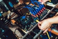 Programmer configures hardware for mining