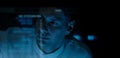 Programmer or Developer working in dark room with computer code reflected on their monitor Royalty Free Stock Photo