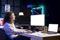 Programmer installing fortified code on mockup PC and laptop