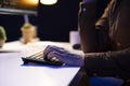 Programmer installing fortified code on PC to prevent cyberattacks, close up