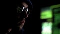 Programmer intently looking at monitor checking data, reflection in glasses Royalty Free Stock Photo