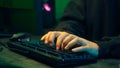 Programmer man keyboard computer typing hacker internet networking online professional software cyber tech security pc Royalty Free Stock Photo