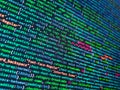 Programmer occupation. HTML CSS3 source code on lcd screen with black background. Information technology website coding standards Royalty Free Stock Photo