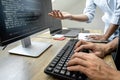 Programmer Team of  Developing programming and website working in a software develop company office, writing codes and typing data Royalty Free Stock Photo