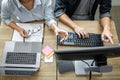 Programmer Team of  Developing programming and website working in a software develop company office, writing codes and typing data Royalty Free Stock Photo