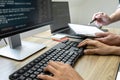 Programmer Team of  Developing programming and website working in a software develop company office, writing codes and typing data Royalty Free Stock Photo