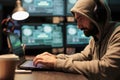 Programmer thief hacking security system on computer Royalty Free Stock Photo