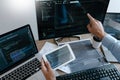 Programmer Typing Code on desktop computer, Developing programming and coding technologies concept Royalty Free Stock Photo