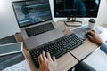 Programmer Typing Code on desktop computer, Developing programming and coding technologies concept Royalty Free Stock Photo