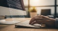 Programmer Typing Code on a Keyboard in a Modern Office Setting Royalty Free Stock Photo