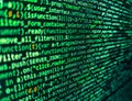 Programmer Typing New Lines of HTML Code. Minificated web development javascript code close up in sunset rays. Programmer Royalty Free Stock Photo