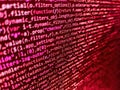 Programmer Typing New Lines of HTML Code. Programming Javascript on laptop computer screen. PHP development, software site code. Royalty Free Stock Photo