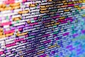 Programmer typing new lines of HTML code. Python programming developer code. Minificated web development javascript code close up Royalty Free Stock Photo
