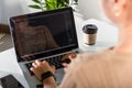 Programmer woman writing program HTML code sitting at workplace in office Royalty Free Stock Photo