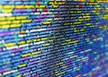 Programmer working on computer screen. Failure in the program, blue screen, programming. Mobile app building. Lines of code of a Royalty Free Stock Photo