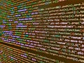 Programmer working in computer screen. Search engine optimization for better rankings with anchor tags. Data optimization. Binary Royalty Free Stock Photo
