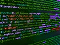 Programmer working on computer screen. Vignette light and dark shadow dramatic effect. Programming Javascript on laptop computer Royalty Free Stock Photo