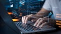 Programmer Working on Laptop with Code and Data Visualization Royalty Free Stock Photo