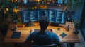 Programmer working late at night on coding project, two monitors displaying lines of code Royalty Free Stock Photo