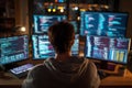 Programmer Working Late at Night with Glowing Screens Royalty Free Stock Photo