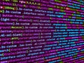 Programmer working in a software develop company office. Tensorflow AI concept. Simple website HTML code with colourful tags in Royalty Free Stock Photo