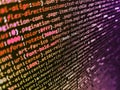 Programmer working in a software develop company office. WWW software development. HTML CSS3 source code on lcd screen with black Royalty Free Stock Photo