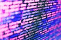 Programmer workplace. Computer script coding source code on desktop monitor. Writing programming code on laptop. Abstract Royalty Free Stock Photo