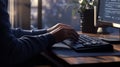 Programmer writing code on computer keyboard at home office Royalty Free Stock Photo