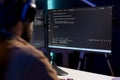 Programmer writing code on computer to futureproof company network Royalty Free Stock Photo