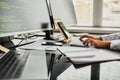 Programmer writing code connecting with smartphone Royalty Free Stock Photo