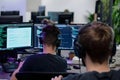 Programmers Collaborate on Software Development Project, Utilizing Advanced Coding Techniques and Modern Technologies for Royalty Free Stock Photo
