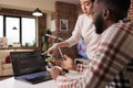 Programmers couple coding security firewall on laptop