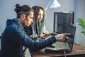 Programmers are developing software by working with software code together. Modern job of web ux Designer Royalty Free Stock Photo