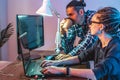 Programmers are developing software by working with software code together. Modern job of web ux Designer Royalty Free Stock Photo