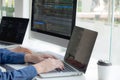 Programmers work on the development of coding and coding technology on white desks and website design, software, data processing Royalty Free Stock Photo