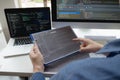 Programmers work on the development of coding and coding technology on white desks and website design, software, data processing Royalty Free Stock Photo