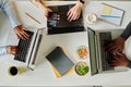 Programmers working online on computers