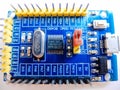 Programming board of Arduino UNO in blue colour isolated in white background Royalty Free Stock Photo