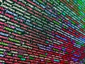 Programming code abstract screen of software developer. Shallow depth of field, selective focus effect. Lots of digits on the Royalty Free Stock Photo